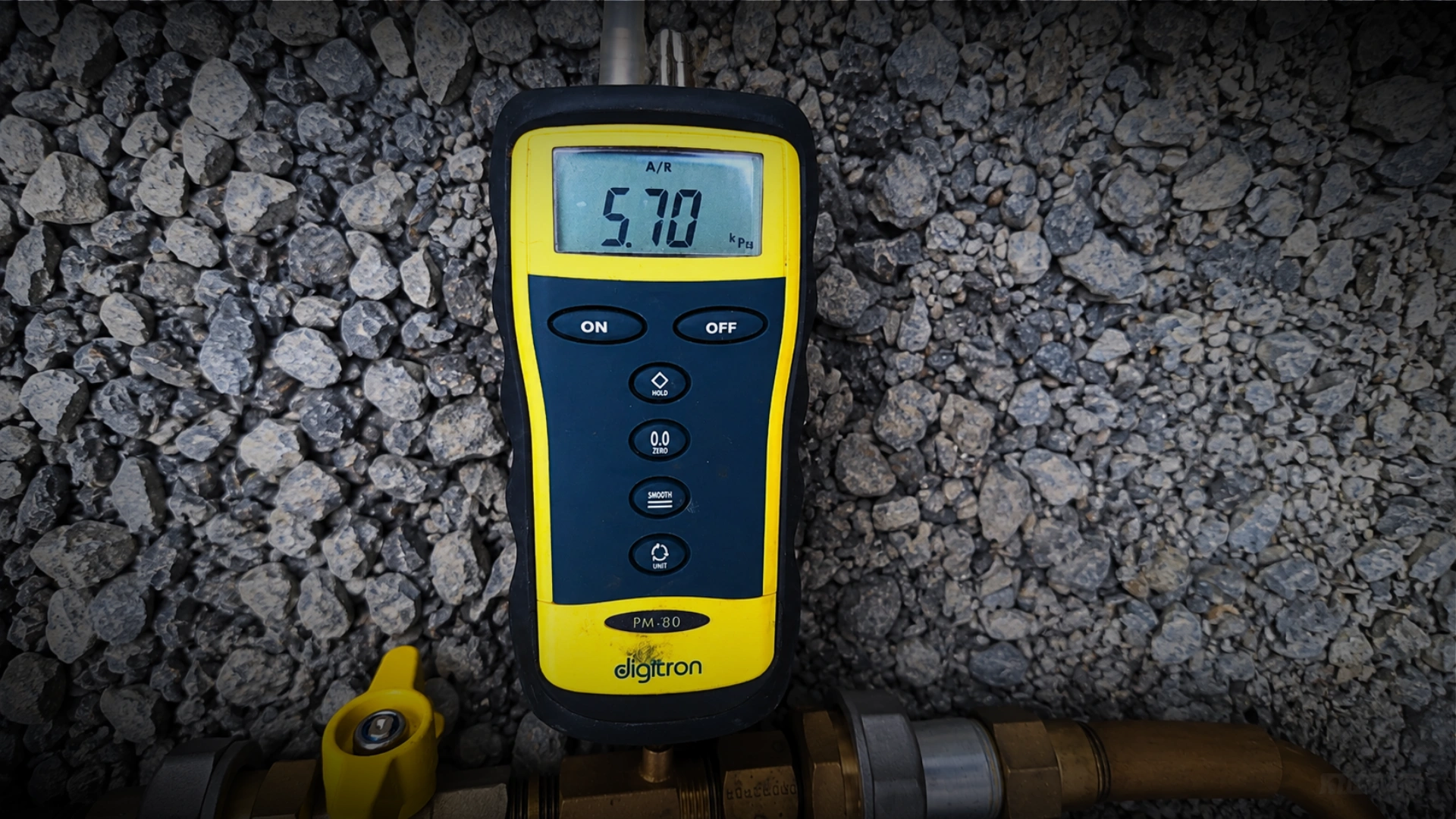 Certified Napier gasfitter connecting a gas line to an instant hot water unit